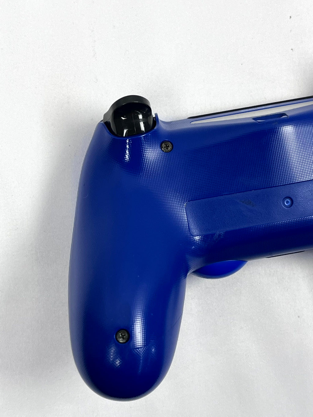 Controller DualShock 4 blu retro dettaglio